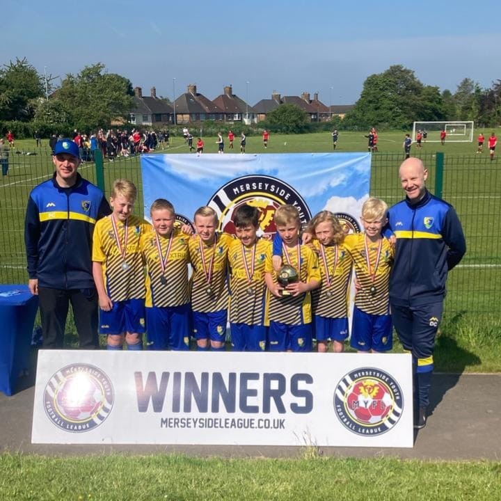 Pex Hill players with winners banner